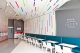 Modern candy store design with acrylic sstripes on wall