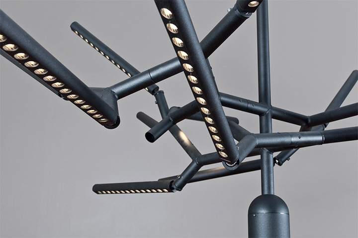 Movable branch light fixture for creating ambiance