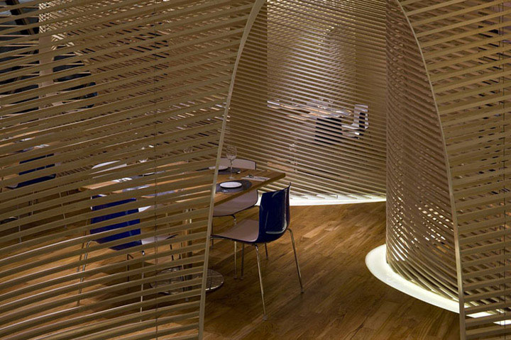 Curved wooden structrures is seafood restaurant