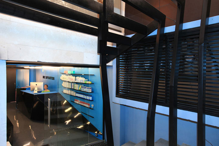 Blue reception area in salon interior design