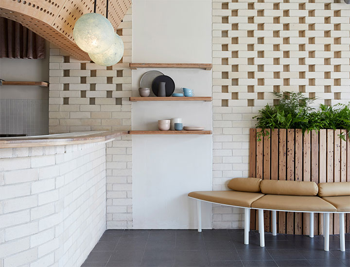 Minimalist dessert store with brick-and-wood theme