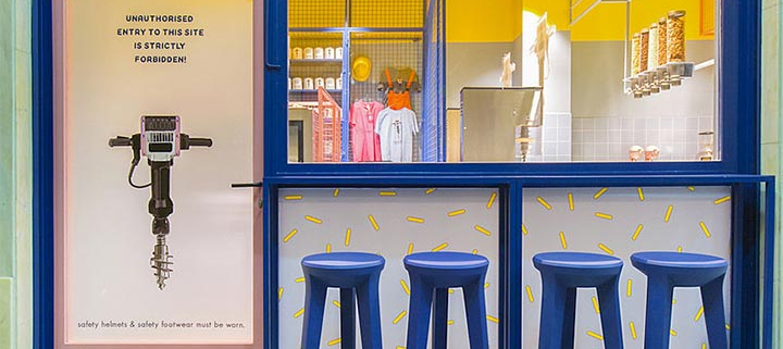 Creative ice cream shop design in bright blue and yellow