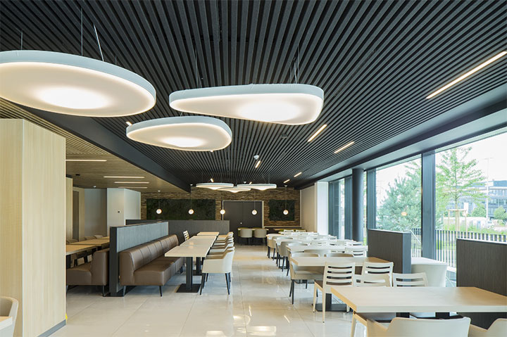 Felt slats as ceiling treatment in contemporary restaurant