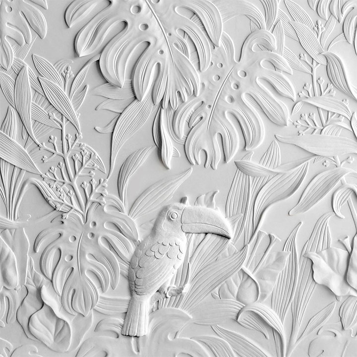 Luxuriant white wall panel depicting exotic plants and toucan