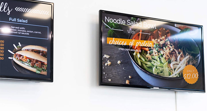 Digital screen displaying special menu items in restaurant