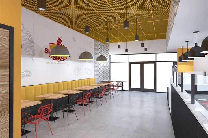 Seating area with orange upholstered benches in restaurant interior