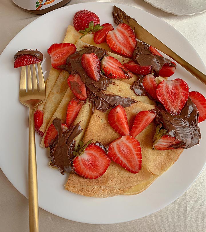 Dessert of crepes with chocolate and strawberry