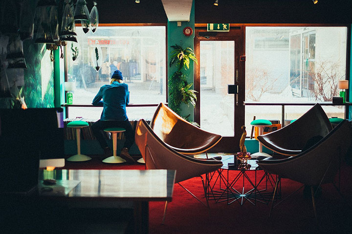 Large window wall of a mid-century-style restaurant