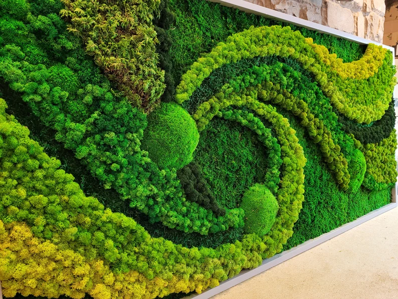 Green selfie wall with elegant patterns made of stabilized moss