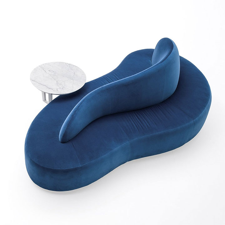 Double-sided sofa with curved lines and atypical shape