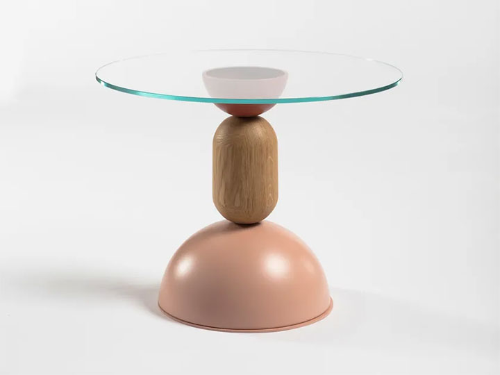Pedestal table combining Peach Fuzz and wood tones