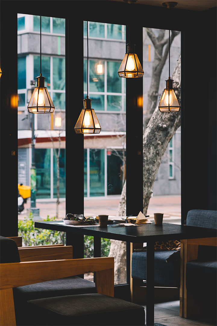Elegant restaurant design with warm lighting and clean lines.