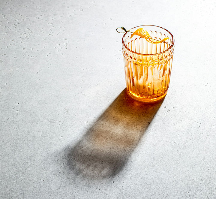 Glass on concrete counter.