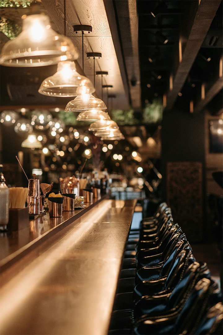 Bar area with laminate counter in small restaurant