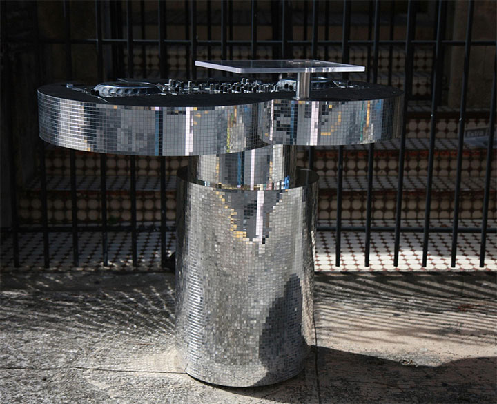 Furniture covered in flexibile decorative panels in silver. 