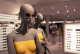 Sunglasses store interior design with custom mannequins.
