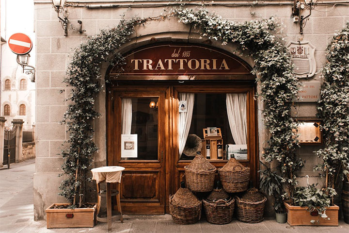 Nostalgic restaurant entrance that evokes old Italian cuisine.