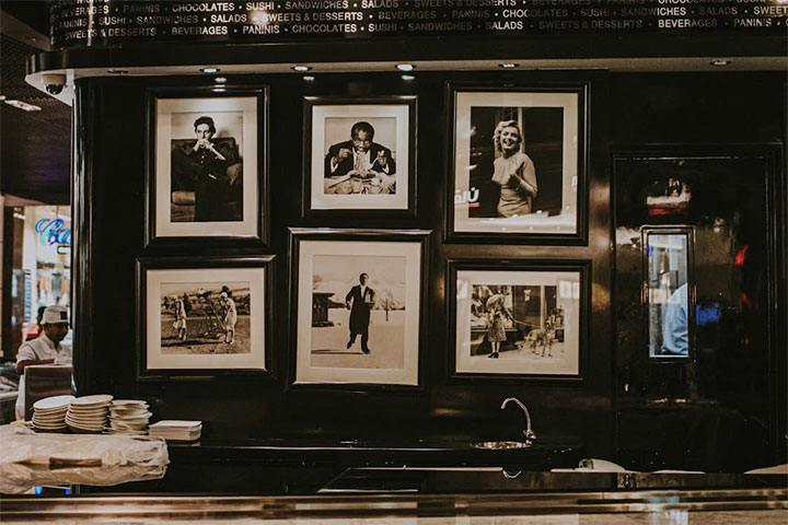 Wall gallery that helps reinforcing the restaurant's brand through interior design and storytelling.