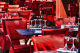 Colorful red furniture in modern restaurant.