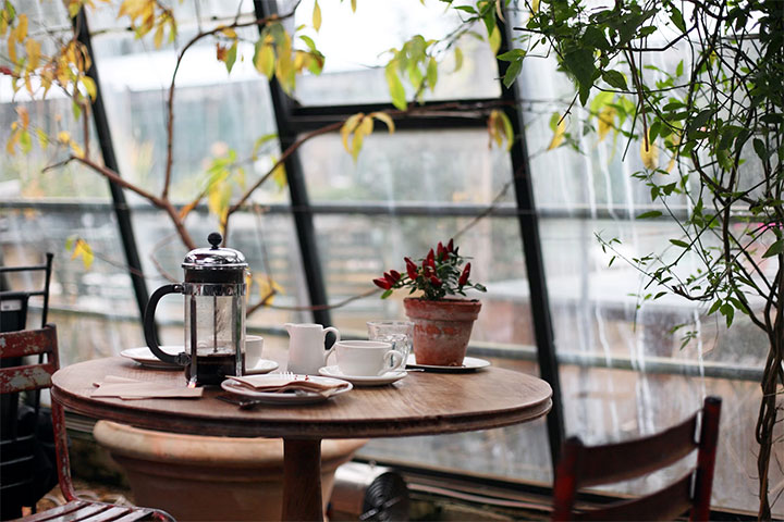 Restaurant table by a large window.