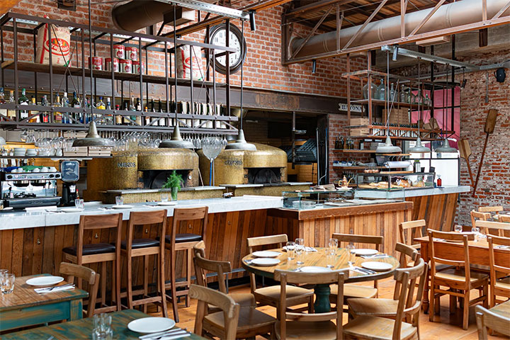 Combination of brick, wood and metal in industrial-style interior.