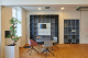 Decorative plant and wood floor in modern office interior.