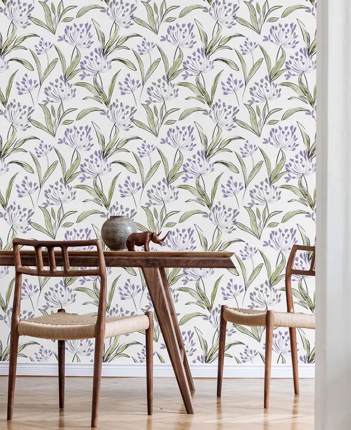 Green-and-lavender floral wallpaper.