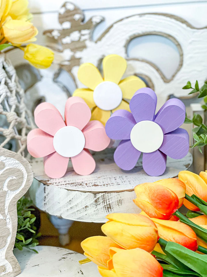 Wooden-flower seasonal decor for dessert shop window displays.