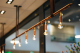 Copper track lighting in an elegant restaurant.