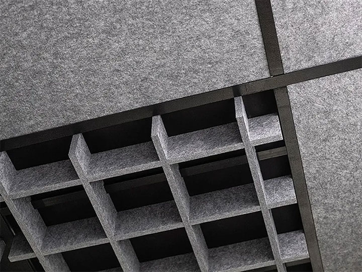 Close-up of ceiling panel grid design.