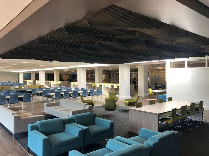Ceiling design idea using black 3D acoustic panels.