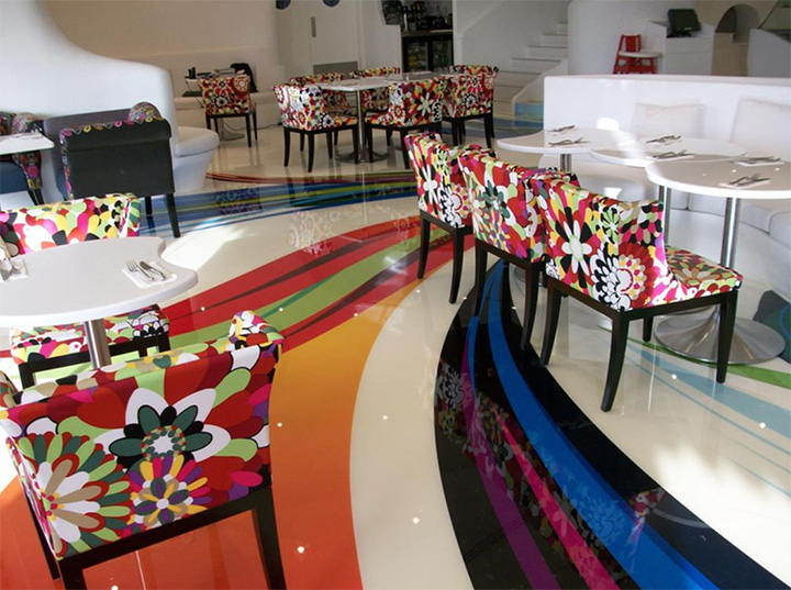 Highly-decorative floor in colorful restaurant.