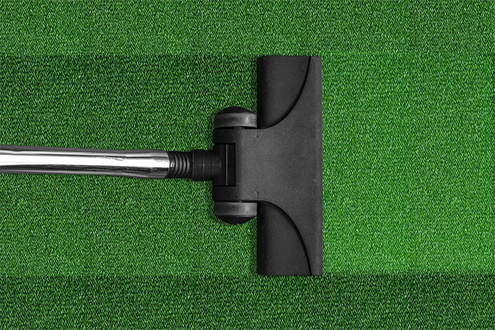 Office rug maintenance with frequent vacuuming.