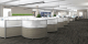Carpeted cublicle area in modern office.