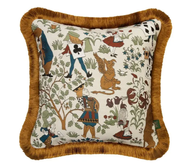 Patterned decorative pillow with fringes.