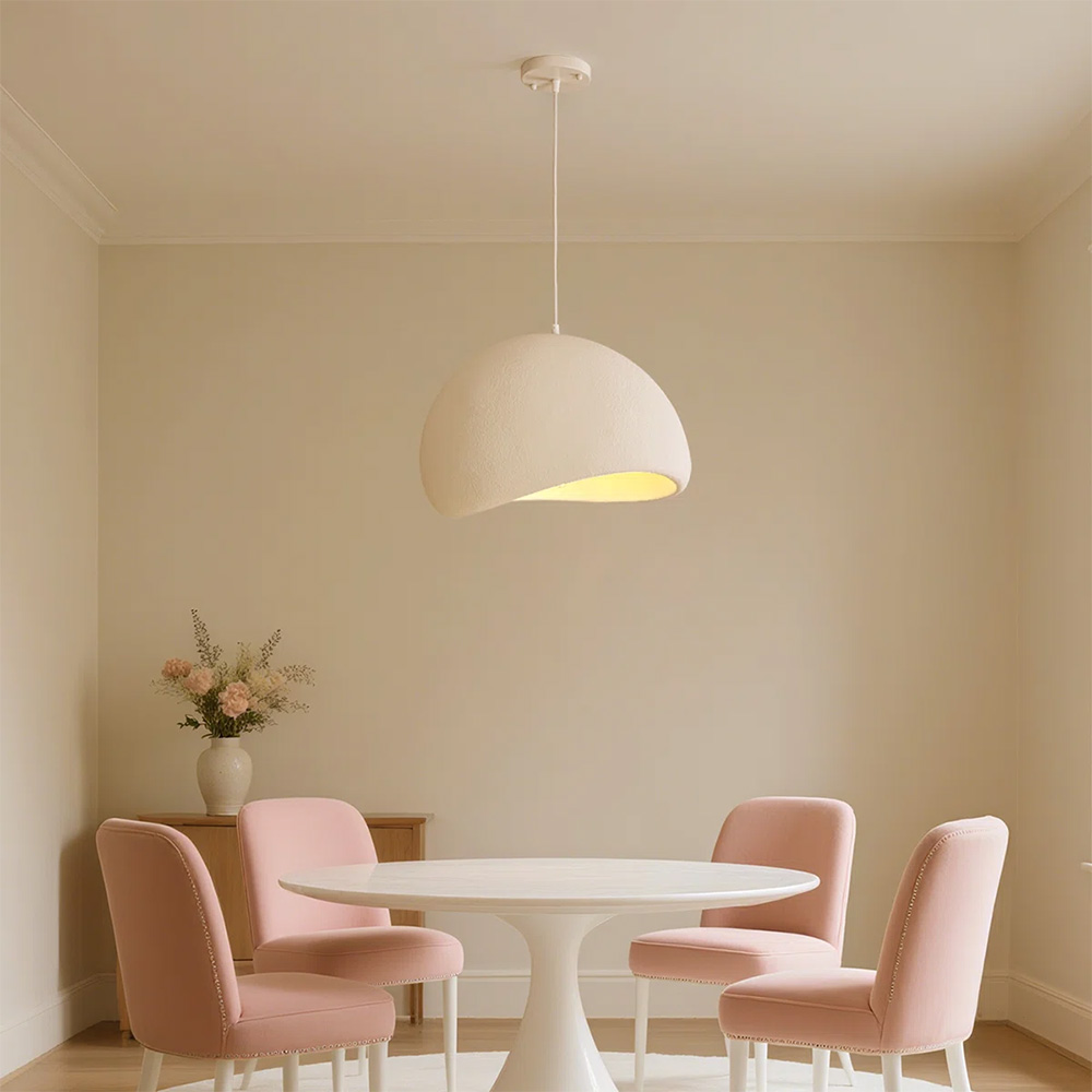 Room featuring the Pantone Color of the Year 2026 and a uniquely shaped light pendant.