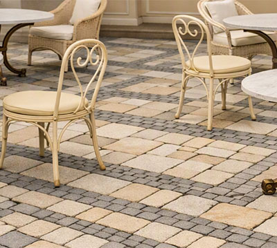 Brick patio pavers arranged in beautiful pattern.
